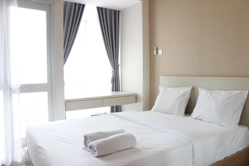 Minimalist Studio Room Taman Melati Apartment Jatinangor By Travelio - image 6