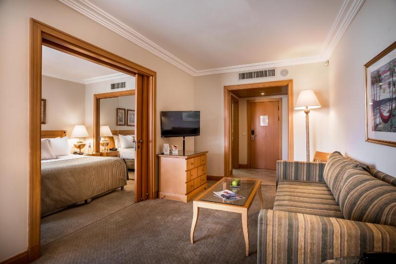 Deluxe One Bedroom Suite with Pool View and Balcony image 2