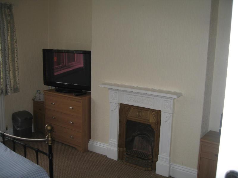 Family Room with Shared Bathroom image 2
