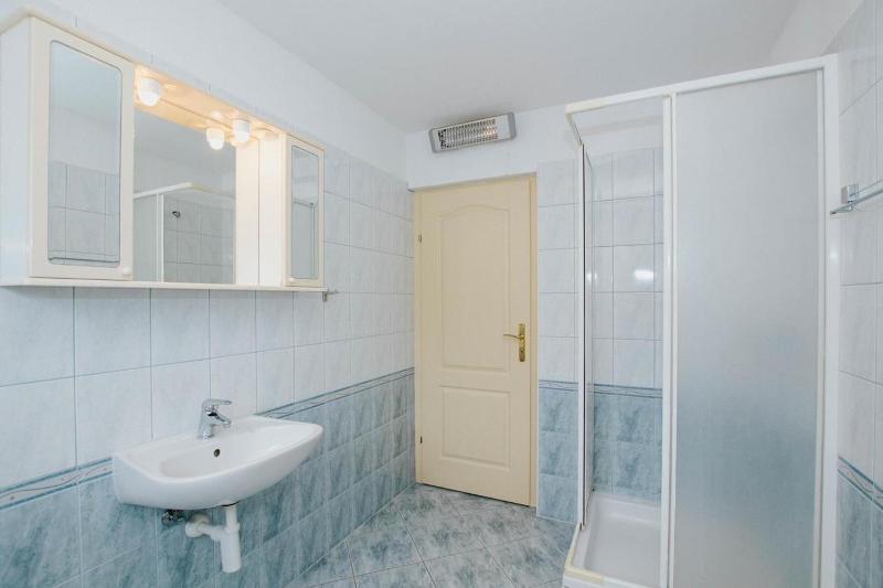 Three-Bedroom Apartment with Balcony and Sea View image 1