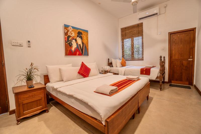 Deluxe Triple Room image 1
