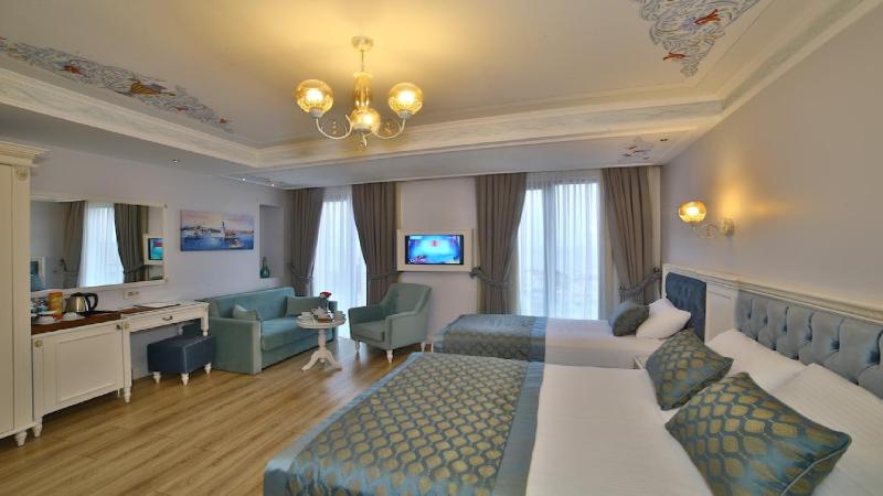 Superior Triple Room with Sea View image 4