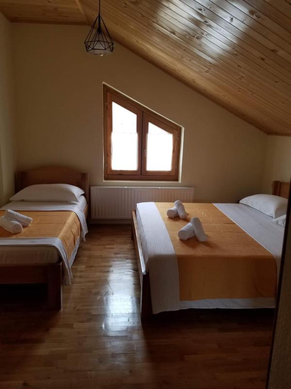 Deluxe Double Room (2 Adults + 1 Child) image 2