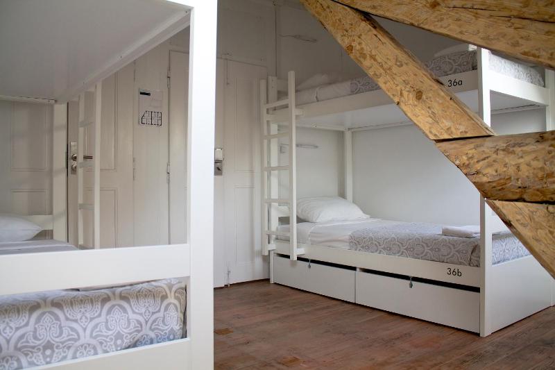 Bed in 4-Bed Dormitory Room with Shared Bathroom image 4