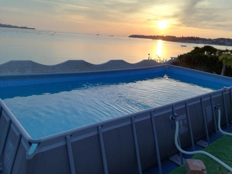 Casa con piscina e vista mare dal giardino - image 40