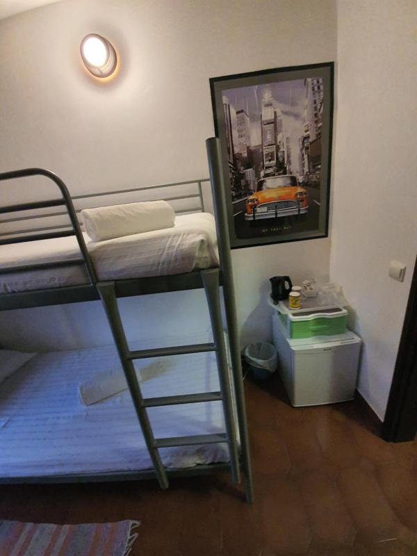 Budget Bunk Bedroom with Shared Bathroom image 3