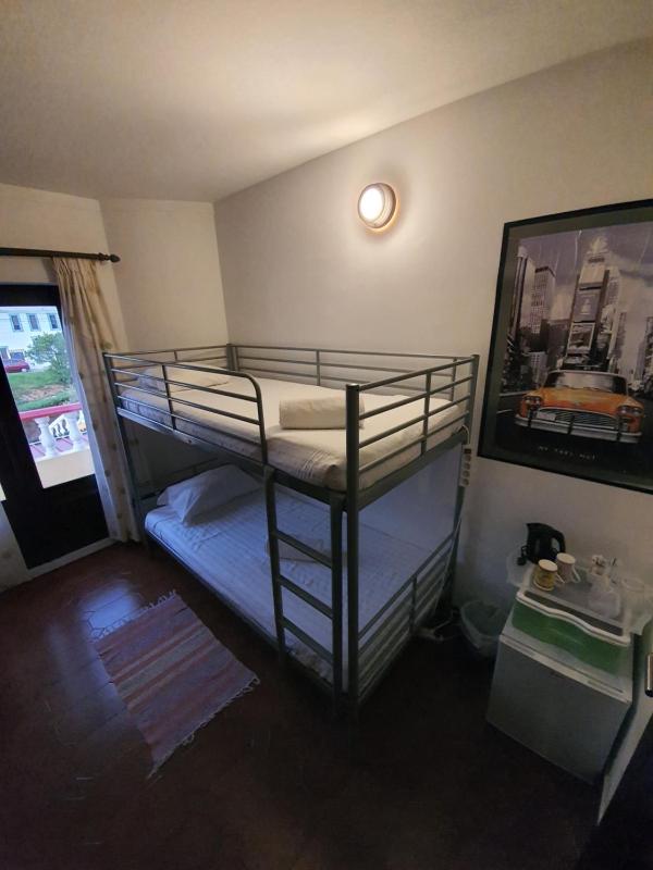 Budget Bunk Bedroom with Shared Bathroom image 2