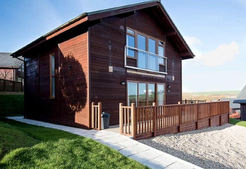 4 Berth Superior Wooden Lodge with Hot Tub Pet Free image 1