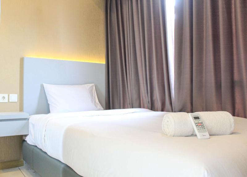 New Furnished with City View 2BR Apartment M-Town Residence By Travelio - image 9