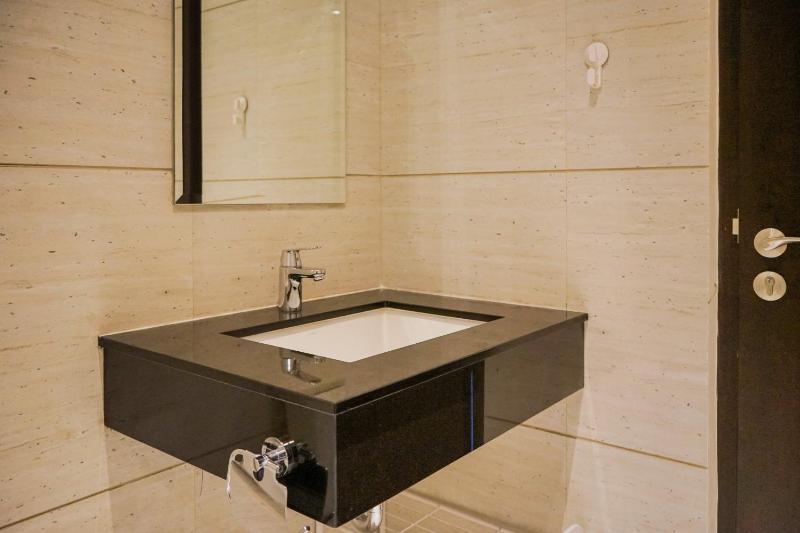 Cozy Living 1BR at Brooklyn Alam Sutera Apartment By Travelio - image 4