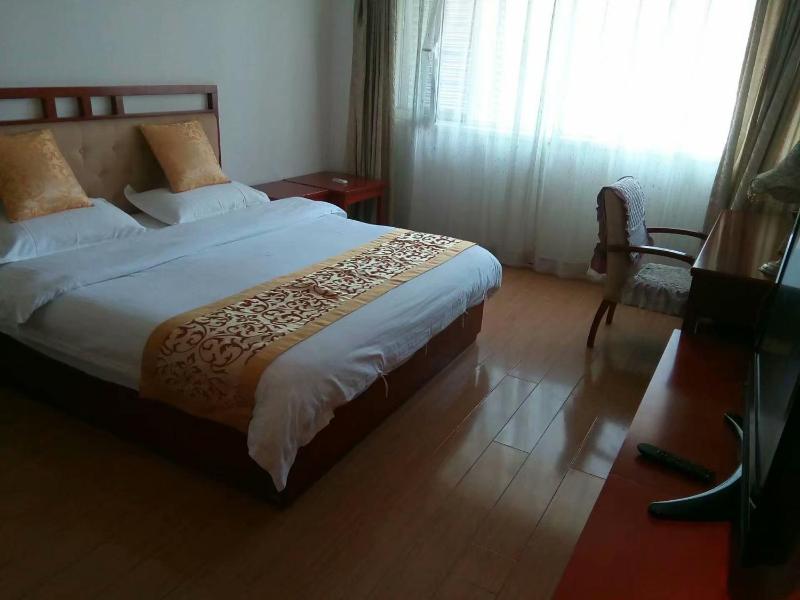 Xinjinshan Yijia Condo Hotel - image 5