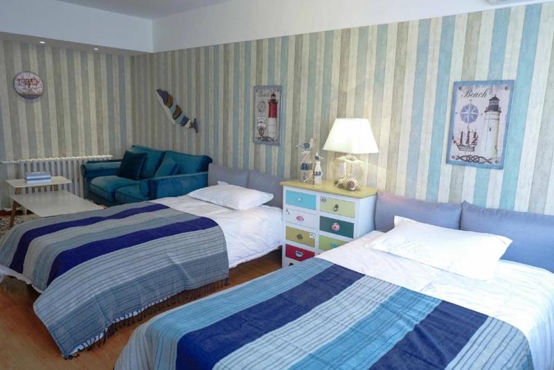 Xinjinshan Yijia Condo Hotel - image 12