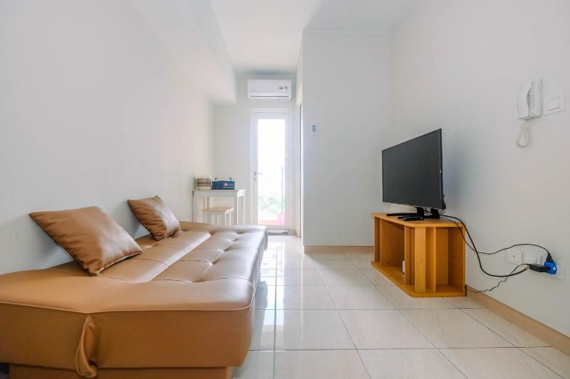 Homey 2BR Apartment at Springlake Summarecon Bekasi By Travelio - image 11