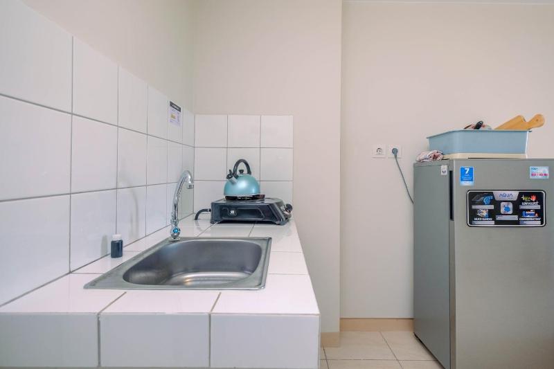 Homey 2BR Apartment at Springlake Summarecon Bekasi By Travelio - image 16