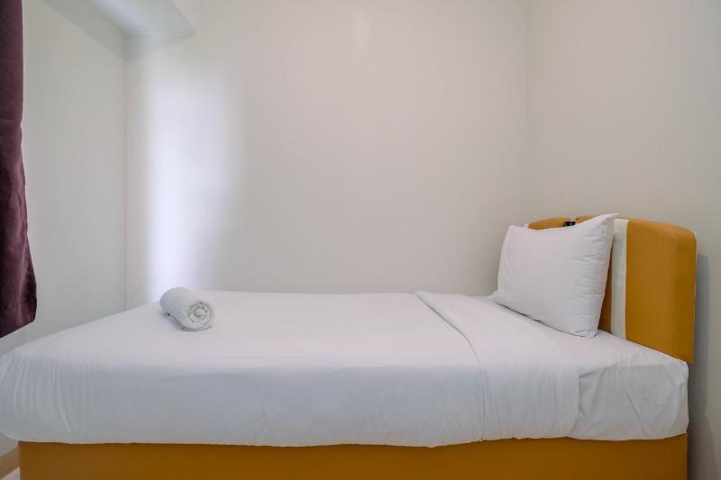 Homey 2BR Apartment at Springlake Summarecon Bekasi By Travelio - image 12