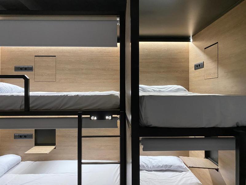 Bed in 4-Bed Mixed Dormitory Room with Private Bathroom image 1