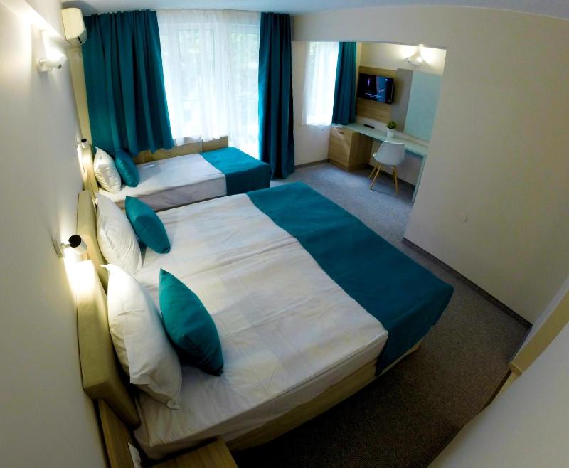 Deluxe Double Room with Balcony (2 Adults + 1 Child) image 2