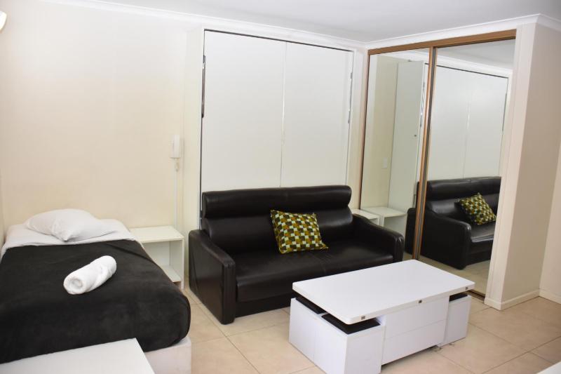 One-Bedroom Apartment with Balcony and City View image 4