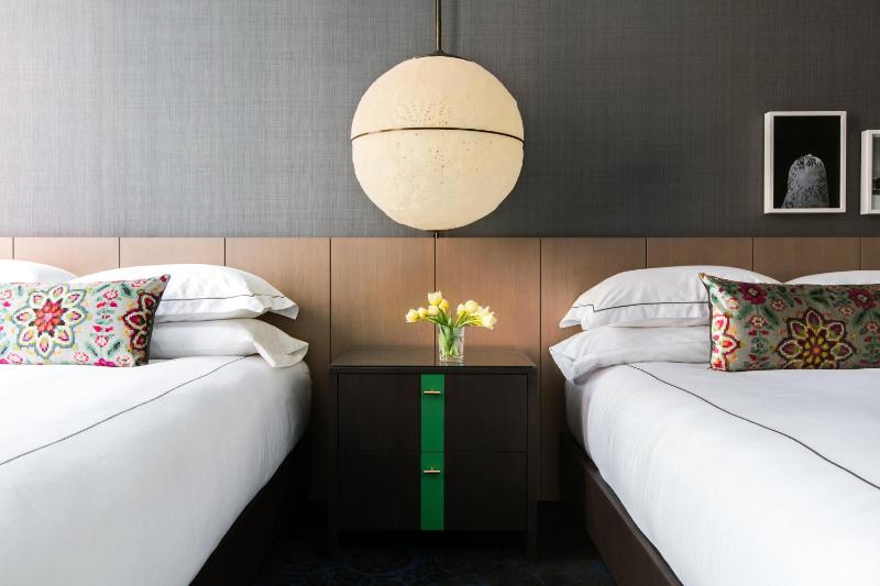 Premium Queen Room with Two Queen Beds and Walk-In Shower image 3