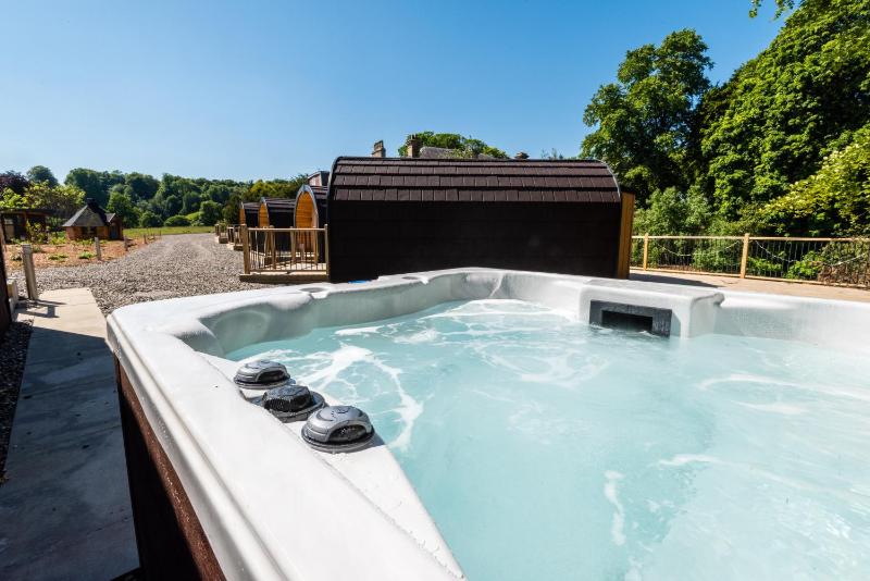 Lodge With Hot Tub image 4