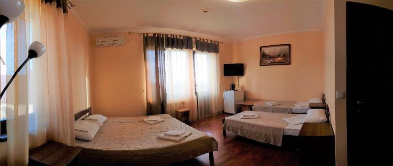 Quadruple Room with Balcony image 1