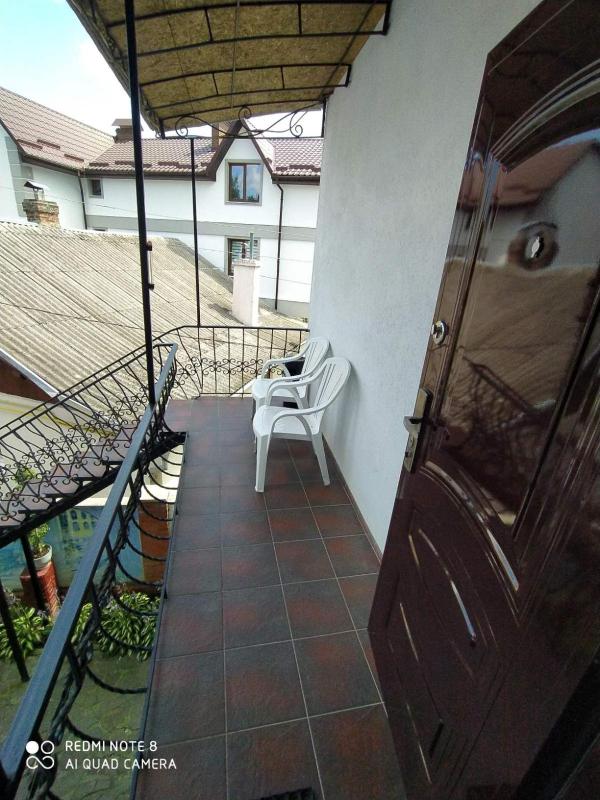 Quadruple Room with Private Bathroom image 2