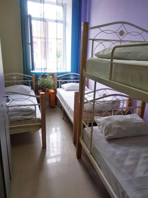 Economy Quadruple Room with Shared Bathroom image 1
