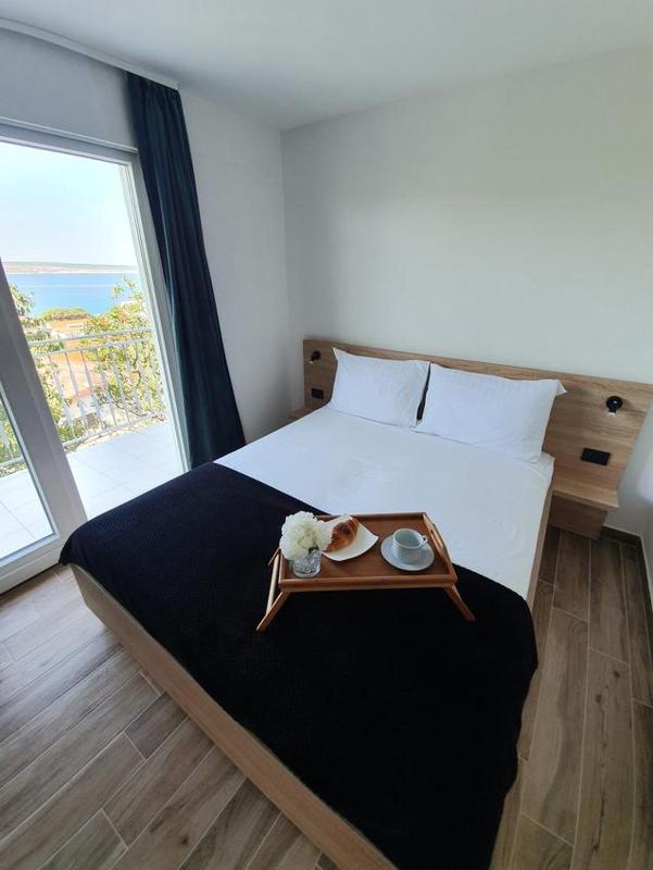 Two-Bedroom Apartment with Balcony and Sea View image 3
