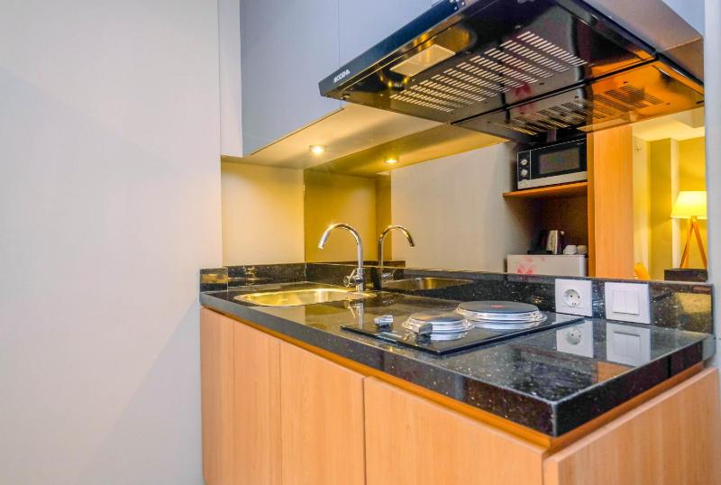 Luxury 1BR Apartment with Golf View at Mustika Golf Residence By Travelio - image 10