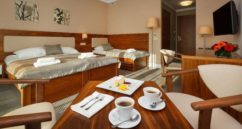 Standard Triple Room with Balcony image 1