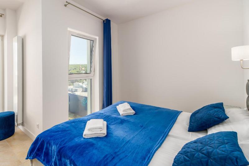 Family Holiday Apartment Aquamarina Prima by Noclegi Renters - image 20