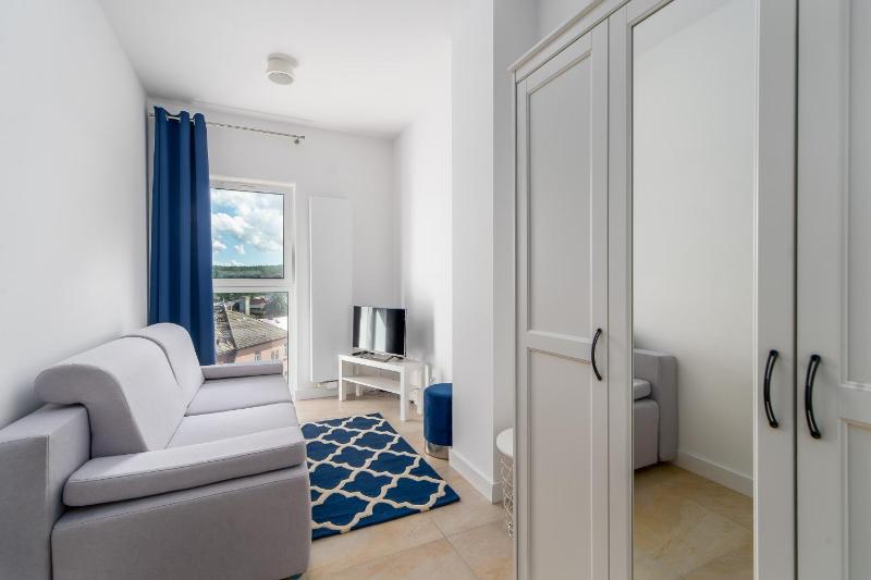 Family Holiday Apartment Aquamarina Prima by Noclegi Renters - image 13