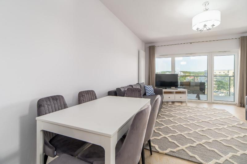 Family Holiday Apartment Aquamarina Prima by Noclegi Renters - image 14