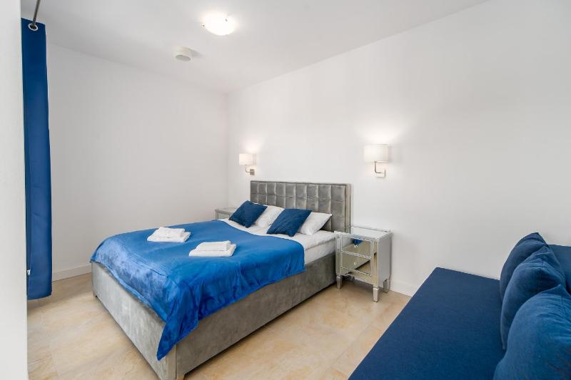 Family Holiday Apartment Aquamarina Prima by Noclegi Renters - image 9
