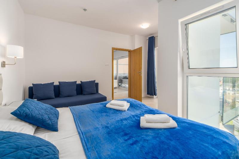 Family Holiday Apartment Aquamarina Prima by Noclegi Renters - image 25