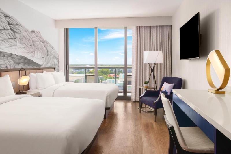 Queen Room with Two Queen Beds and Balcony image 1