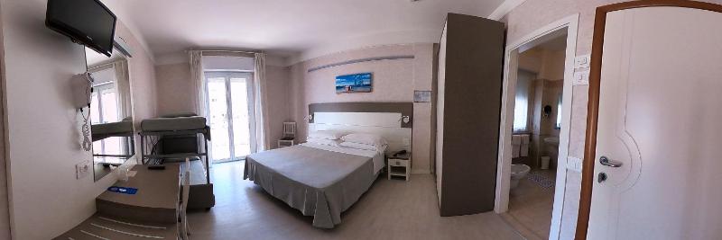 Superior Triple Room with Side Sea View image 2