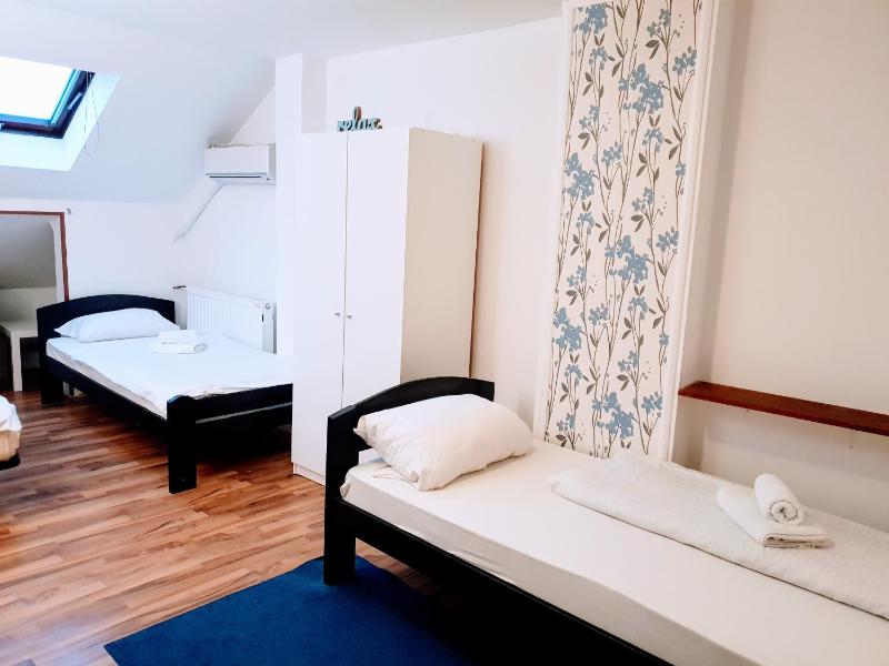 Quadruple Room with Private Bathroom image 1