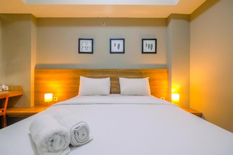Chic and Cozy 1BR Apartment at Mustika Golf Residence By Travelio - image 1