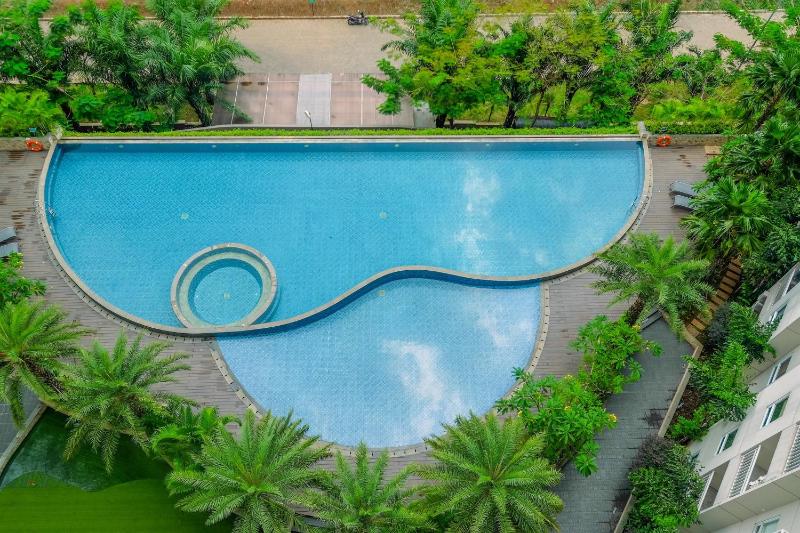 Chic and Cozy 1BR Apartment at Mustika Golf Residence By Travelio - image 11