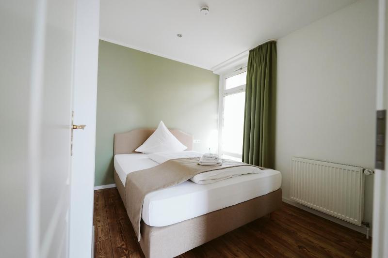 Deluxe Queen Room with Two Queen Beds image 2