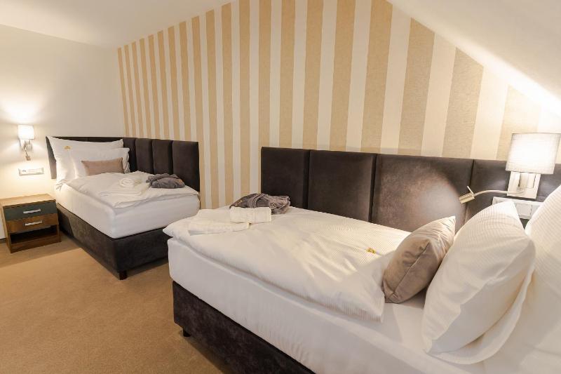 Triple Room with Private Bathroom image 1