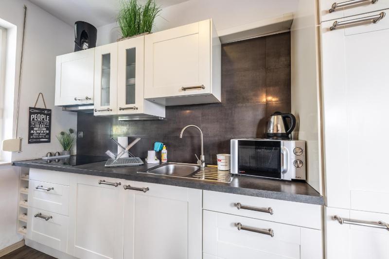 Victus Cozy Apartment with Underground Parking by Noclegi Renters - image 7