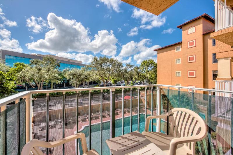 Double Room with Two Double Beds, Balcony and Pool View image 1