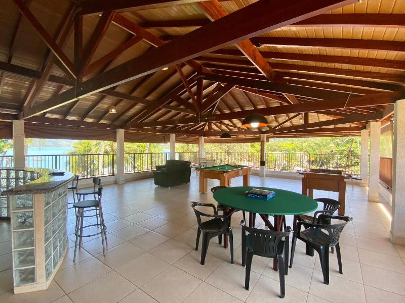 Magnífica casa pé na areia 4 suítes c/ ar e piscina - image 37