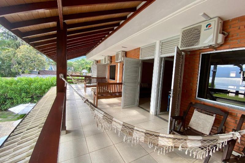 Magnífica casa pé na areia 4 suítes c/ ar e piscina - image 25