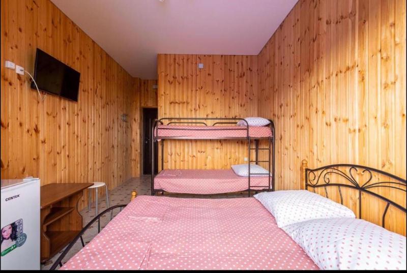 Quadruple Room with Private Bathroom image 2