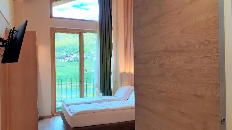 Family Room with Balcony image 2