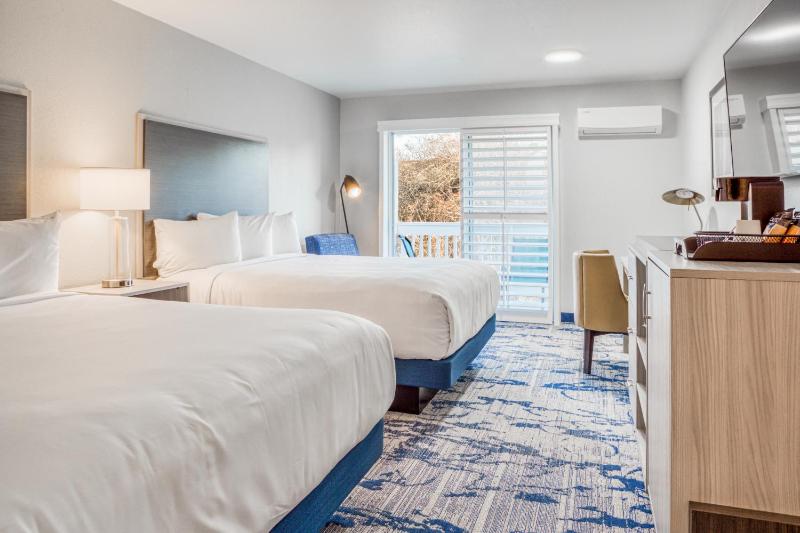 Queen Room with Two Queen Beds and Balcony image 1