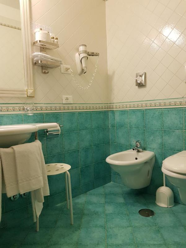 Triple Room with Balcony and Partial Sea View image 3